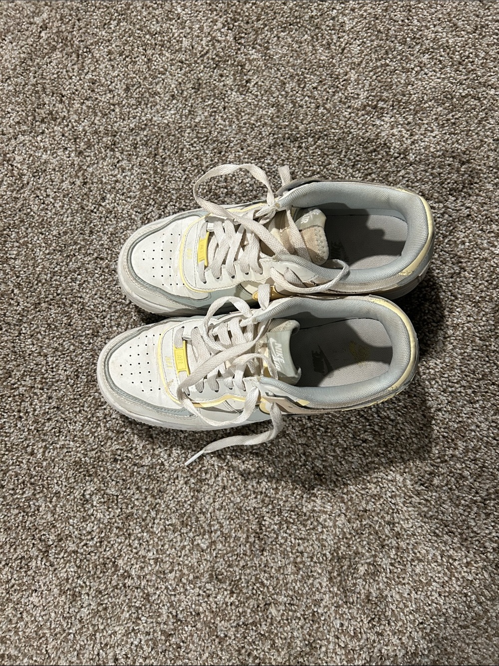 Nike White Sneakers with Pale Yellow Trim